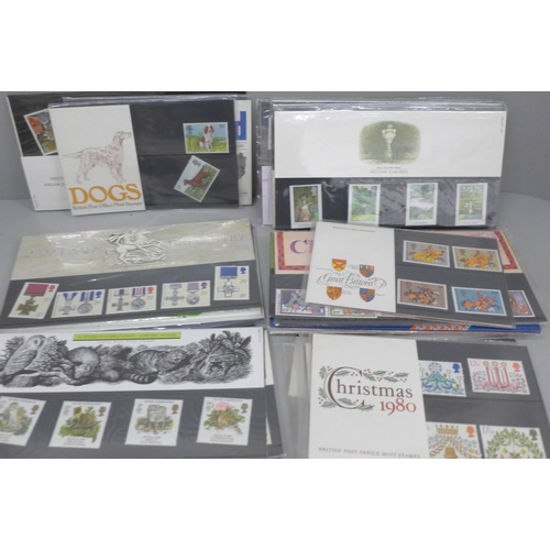 705 - A box of eighty Royal Mail stamp presentation packs