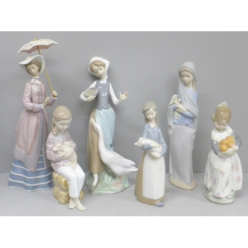 712 - Six Lladro figures, matt finish figure with chip to petals of flowers