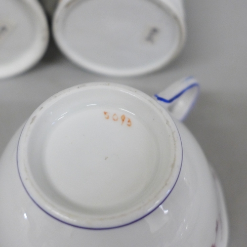 717 - Three Victorian cups and saucers and two small mugs, Welsh costumes, a Georgian New Hall saucer and ... 