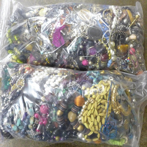 722 - Two bags of costume jewellery