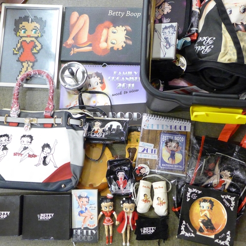 723 - A box of Betty Boop collectables including two bags, ashtrays, boxing gloves, shower gel, seven plas... 