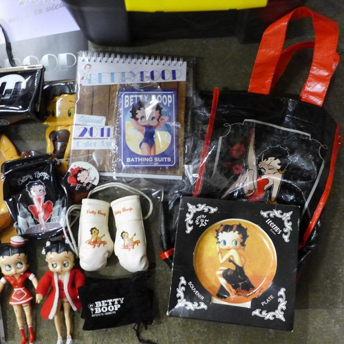 723 - A box of Betty Boop collectables including two bags, ashtrays, boxing gloves, shower gel, seven plas... 