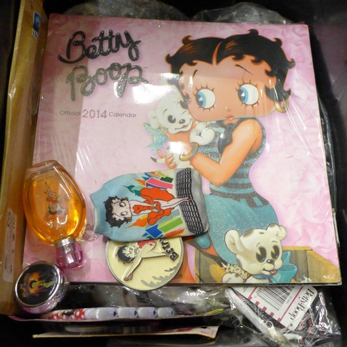 723 - A box of Betty Boop collectables including two bags, ashtrays, boxing gloves, shower gel, seven plas... 