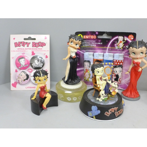 723 - A box of Betty Boop collectables including two bags, ashtrays, boxing gloves, shower gel, seven plas... 