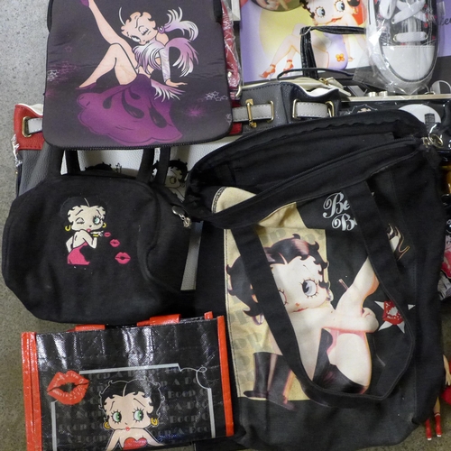 723 - A box of Betty Boop collectables including two bags, ashtrays, boxing gloves, shower gel, seven plas... 