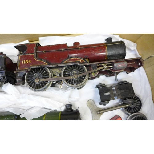 739 - O gauge model rail; two tin plate locomotives and tenders, three wagons and other items