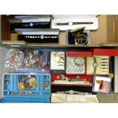 745 - A box of mixed costume jewellery and boxed lady's wristwatches