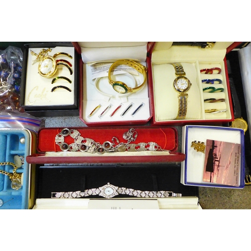 745 - A box of mixed costume jewellery and boxed lady's wristwatches