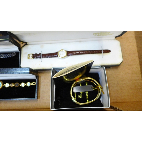 745 - A box of mixed costume jewellery and boxed lady's wristwatches