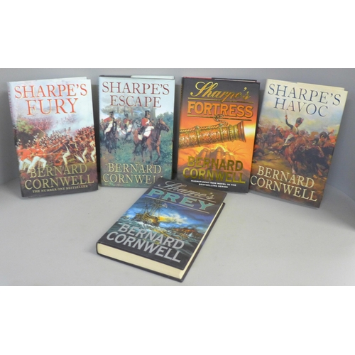 755 - Five hardback first edition novels by Bernard Cornwell from the Sharpe series; Sharpe's Fortress 199... 