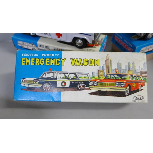 769 - Four Shudo friction powered emergency vehicles, made in Japan, Police, Fire, Ambulance and Rescue