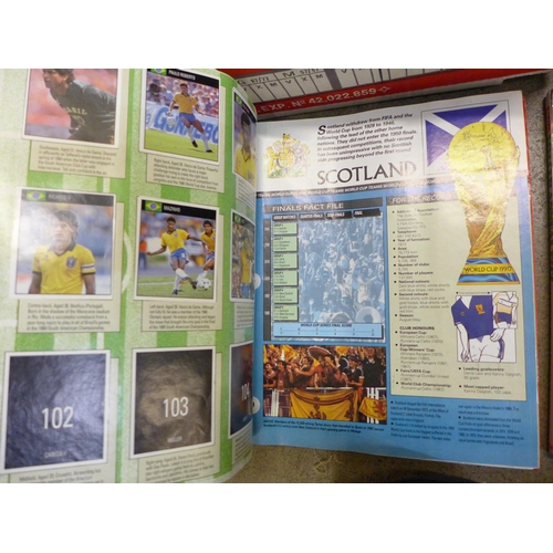 772 - A box of Football books including a 1991 FA Cup Final programme and a World Cup 90 sticker album/fol... 