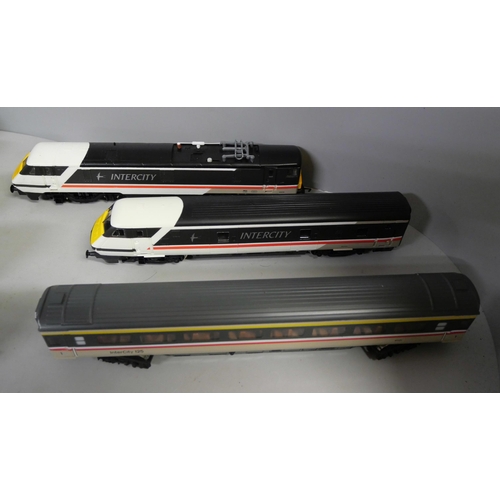 794 - OO gauge model rail, six coaches, a dummy car and a motor car