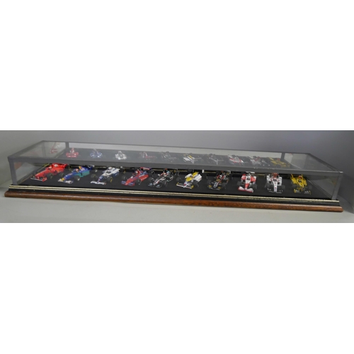 797 - A cased set of ten model Formula 1 racing cars, 1:43 scale