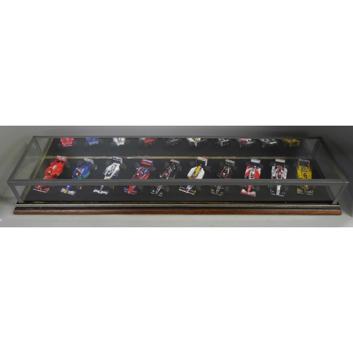 797 - A cased set of ten model Formula 1 racing cars, 1:43 scale