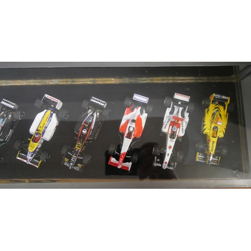 797 - A cased set of ten model Formula 1 racing cars, 1:43 scale