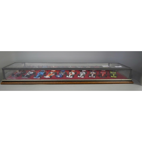 798 - A cased set of ten model Formula 1 racing cars, 1:43 scale