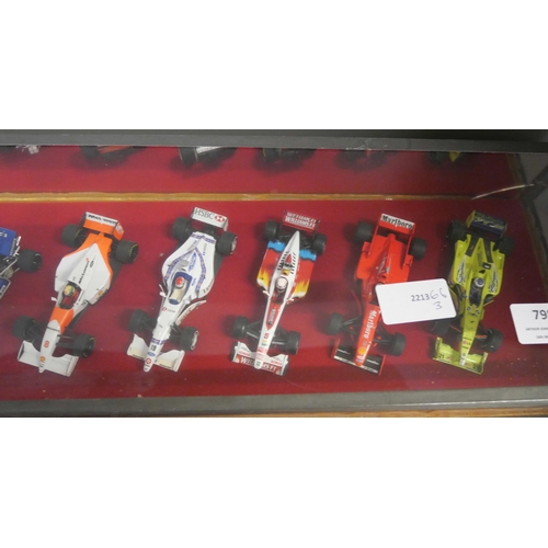 798 - A cased set of ten model Formula 1 racing cars, 1:43 scale