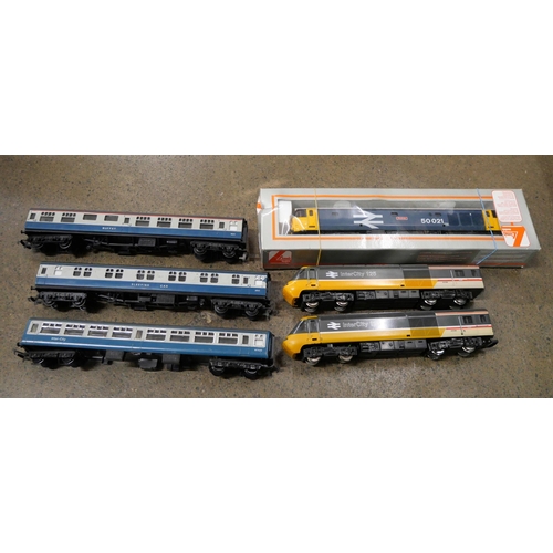 806 - OO gauge model rail, a collection of track, a blue diesel engine, three Intercity coaches and two In... 