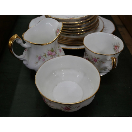 810 - A Paragon Victoriana Rose six setting tea set with sandwich plate, lacking one cup **PLEASE NOTE THI... 