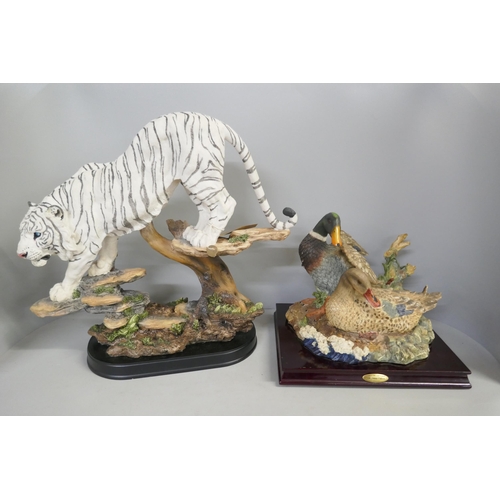 815 - Two resin figure groups; a model of a Siberian tiger and mallard ducks