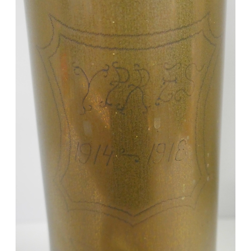 817 - A WWI trench art brass shell case, base dated 1916, Ypres, 1914-1918 engraving