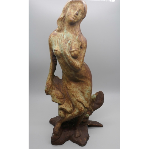 820 - A cast iron figure of a maiden, 30cm