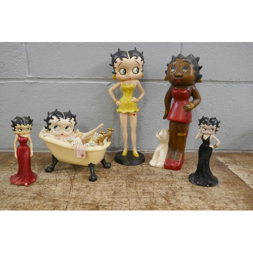 822 - Six Betty Boop resin figures including one in lemon yellow glitter dress, one in bathtub, one seated... 