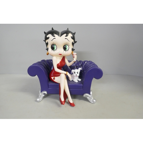 822 - Six Betty Boop resin figures including one in lemon yellow glitter dress, one in bathtub, one seated... 