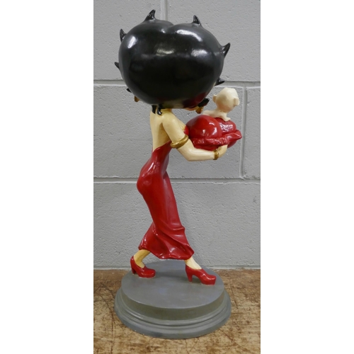 823 - A Betty Boop figure on stand, 55cm