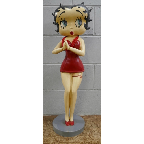 824 - A large Betty Boop figure on stand, 85cm