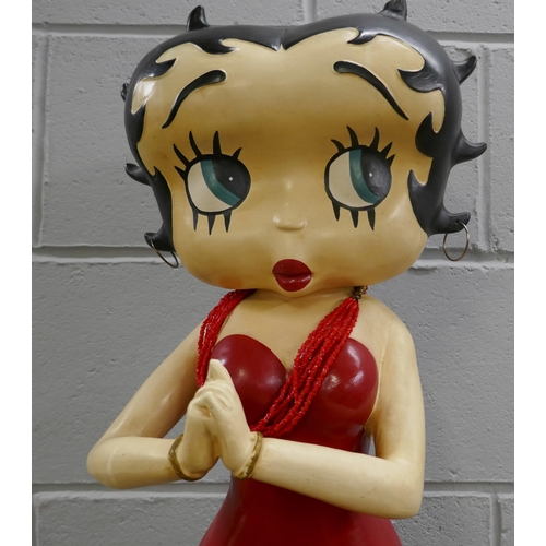 824 - A large Betty Boop figure on stand, 85cm