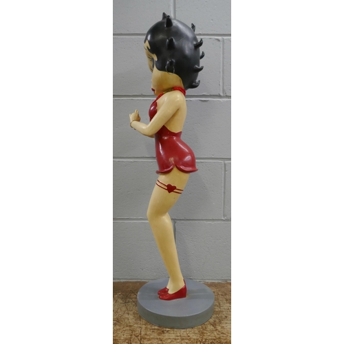 824 - A large Betty Boop figure on stand, 85cm