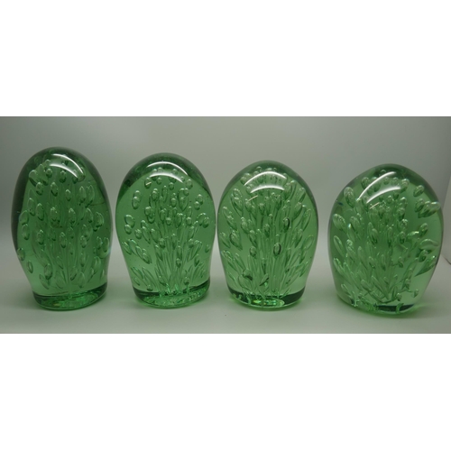 828 - Four Victorian green glass dumps