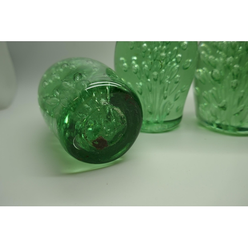 828 - Four Victorian green glass dumps