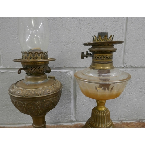 833 - Two oil lamps **PLEASE NOTE THIS LOT IS NOT ELIGIBLE FOR POSTING AND PACKING**