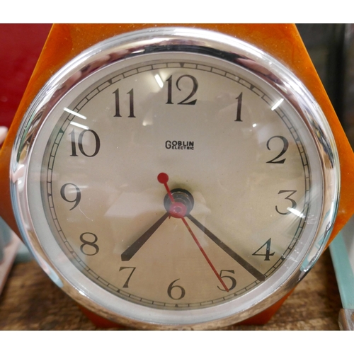 834 - Art Deco items, two drinks trays, biscuit barrel, two clocks, one in phenolic butterscotch and three... 