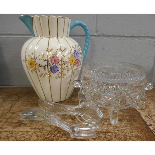 836 - A large early 20th Century jug with floral detail, a glass bowl and two pairs of salad servers