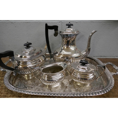 838 - A four piece silver platd tea service and two handled gallery tray