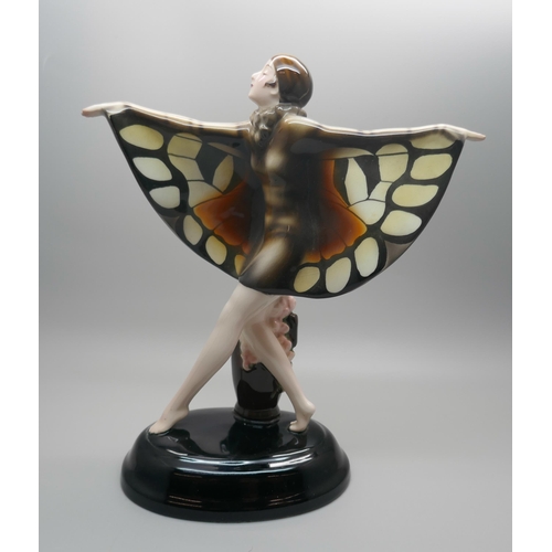 843 - An Art Deco Lorenzl Goldscheider ceramic figure, Butterfly Girl, printed mark and impressed numbers ... 