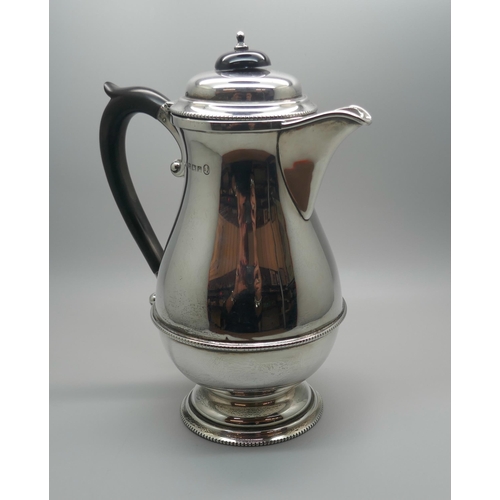 852 - A silver water jug, Birmingham 1952, 375g