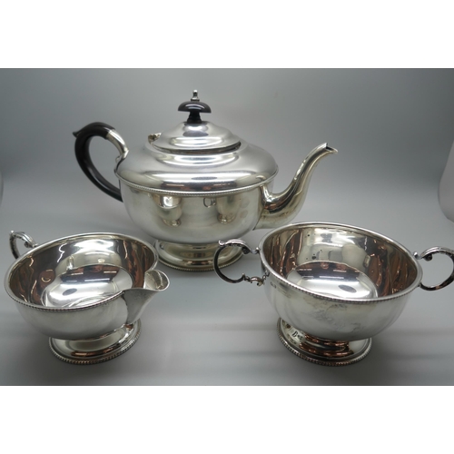 854 - A three piece silver tea service, Birmingham 1958, 627g