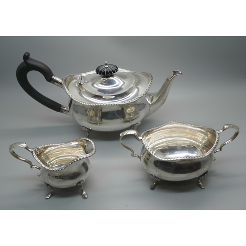 857 - A three piece silver bachelors tea service, Birmingham 1927, 540g