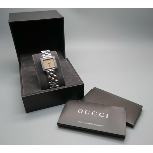 861 - A lady's Gucci 3600L wristwatch, boxed, bezel detached and a/f, with paperwork