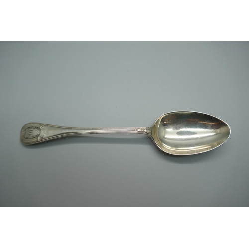 864 - A Victorian silver serving spoon, Sheffield 1887, 54g, 19cm