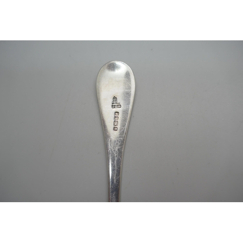 864 - A Victorian silver serving spoon, Sheffield 1887, 54g, 19cm