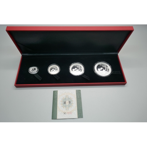 869 - A 2017 Munich International Coin Show silver proof panda set of four coins, 99.9% silver