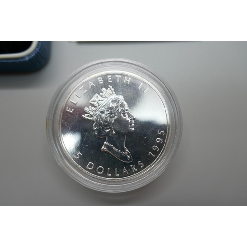 870 - A 1990 silver proof one pound coin and a 1995 9999 silver proof 1oz Maple 5 Dollars