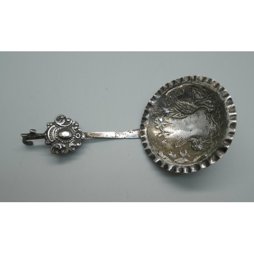 873 - A ladle embossed with storks, London 1902 import mark, 26g, bowl 57mm diameter