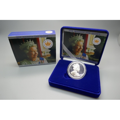 879 - A The Royal Mint 2002 Golden Jubilee 925 silver five pounds coin, boxed